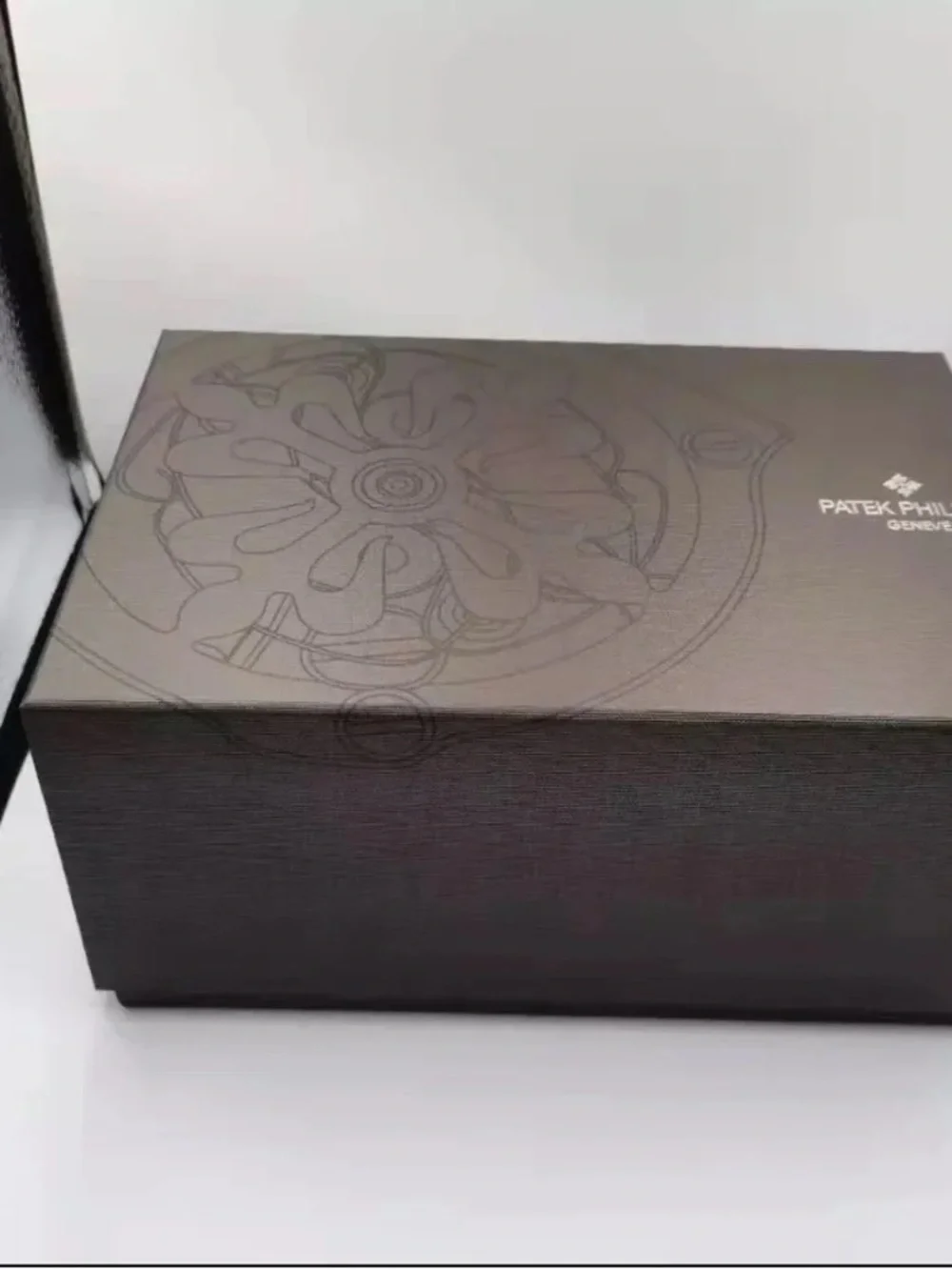 Patek Philippe Brown and Black High-Gloss Wood Watch Box with Silver Emblem